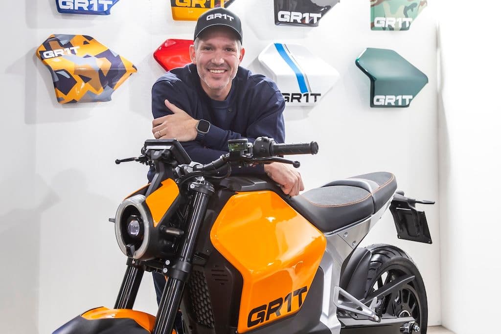 GR1T CEO Omar Abukhlal leaning on the G1S electric motorcycle.jpg